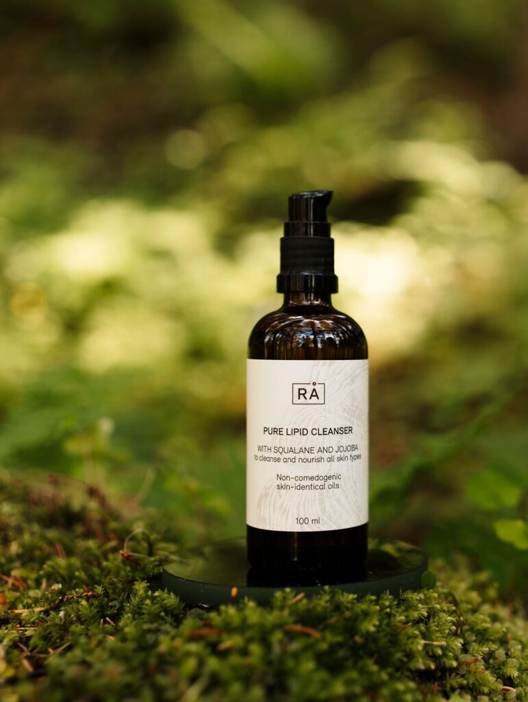 pure lipid cleanser with forest background