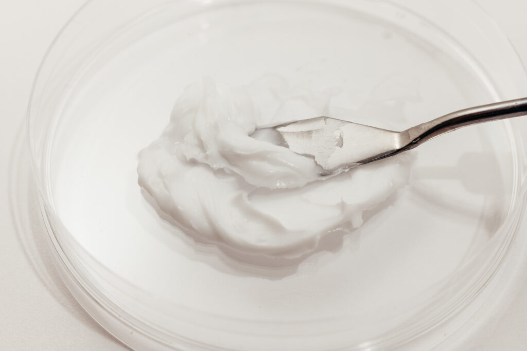 Teksturbilde av fuktighetskrem for tørr hud